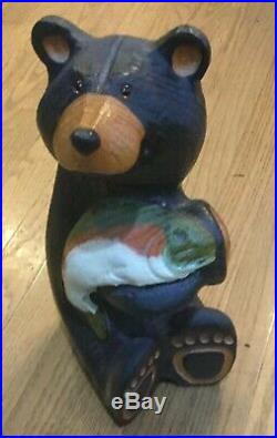 Bear Holding Fish Wood Carving from Big Sky Carvers. Made around 1998