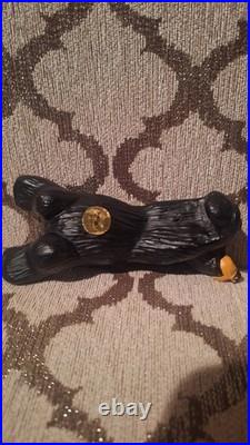 Big Sky Carvers Jeff Fleming Bear Foots Hanging On A Ledge Bear Figurine Shelf