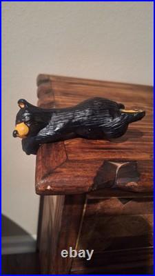 Big Sky Carvers Jeff Fleming Bear Foots Hanging On A Ledge Bear Figurine Shelf