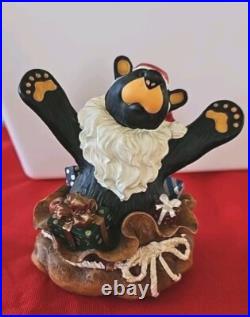Big Sky Carvers Jeff Fleming Black Bear Santa's Surprise Christmas package Bag