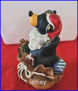 Big Sky Carvers Jeff Fleming Black Bear Santa's Surprise Christmas package Bag