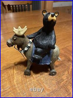 Big Sky Carvers bear riding reindeer