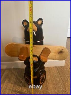 Big sky carvers snowboarding bear