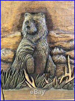 Custom NRA Big Sky Carvers wall Wood cabinet with 3D Grizzly Bear Door Carving
