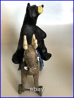 RARE Big Sky Carvers Jeff Fleming Black Bear riding toy reindeer / moose daisies